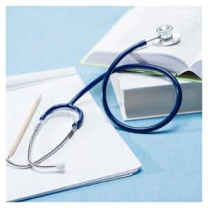 Stethoscope on a notepad & books