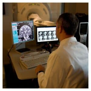 Doctor performing brain scan