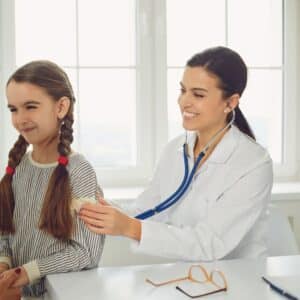 Pediatrician and child.