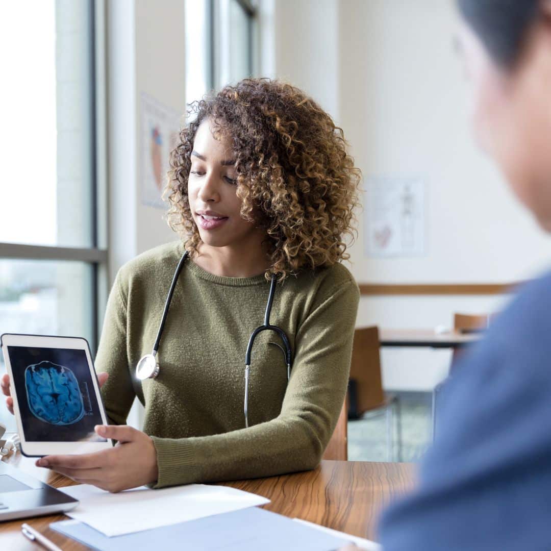 Doctor going over results