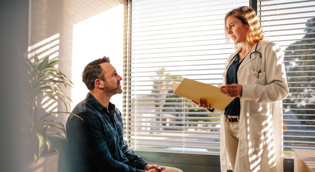 doctor speaking with patient