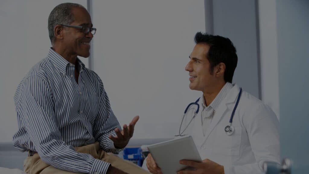 man talking with doctor|making a list|consulting with doctor|sensory test|memory test