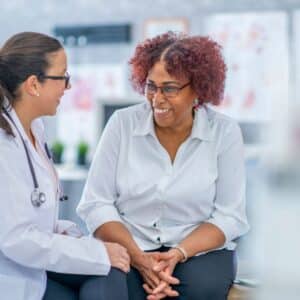 neurologist smiling with patient