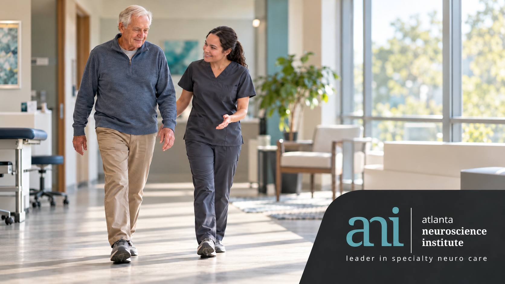 Clinician assisting an older adult with walking and balance during Parkinson’s care, with the Atlanta Neuroscience Institute